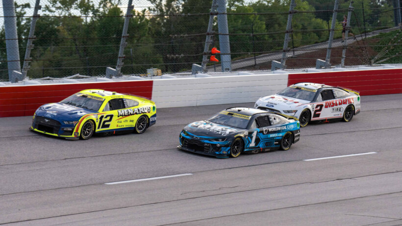 Ross Chastain, Ryan Blaney, and Austin Cindric racing at the COOK OUT Southern 500 at Darlington Raceway