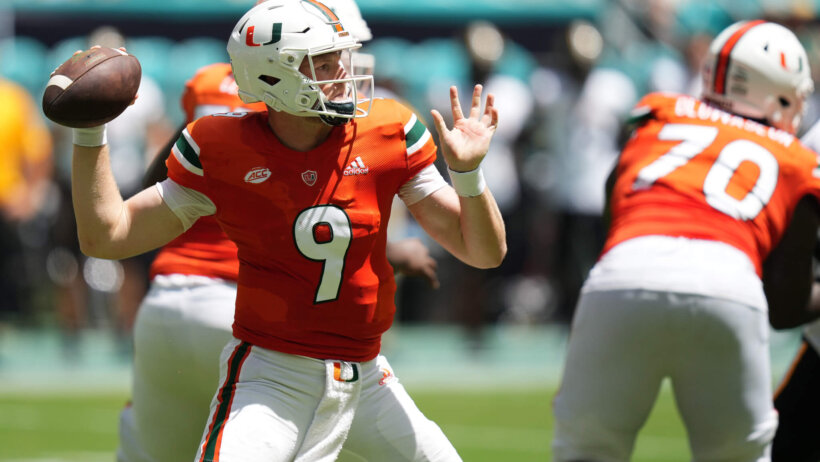 Miami Hurricanes quarterback Tyler Van Dyke attempts a pass