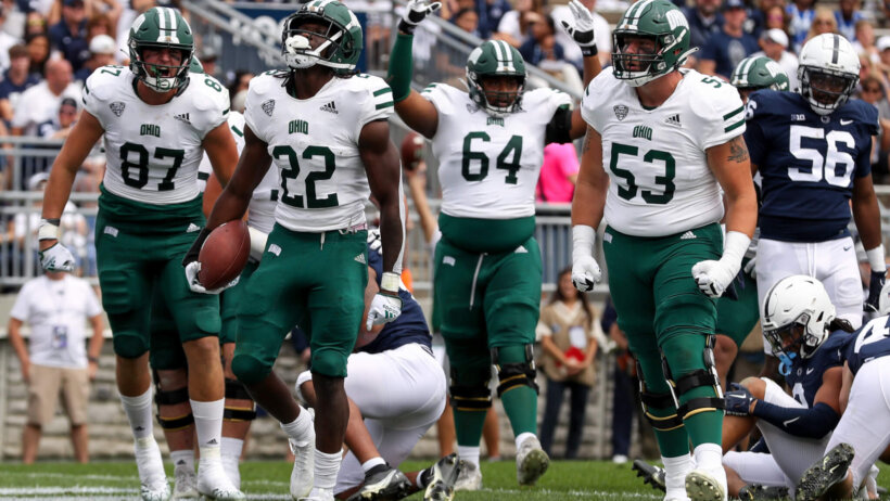 Ohio Bobcats running back Sieh Bangura celebrates with teammates