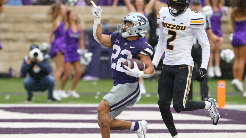 Kansas State Wildcats running back Deuce Vaughn celebrates a touchdown