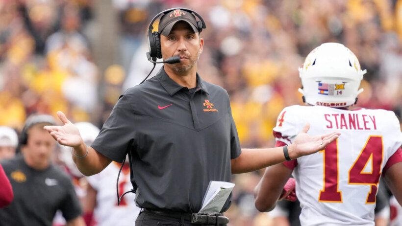 Iowa State head football coach Matt Campbell shrugs on the field