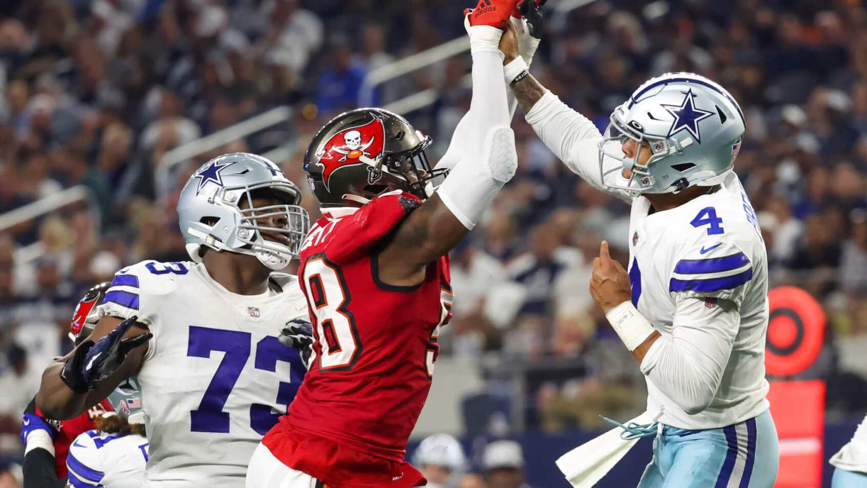 Dak Prescott hits his thumb off Shaquil Barrett