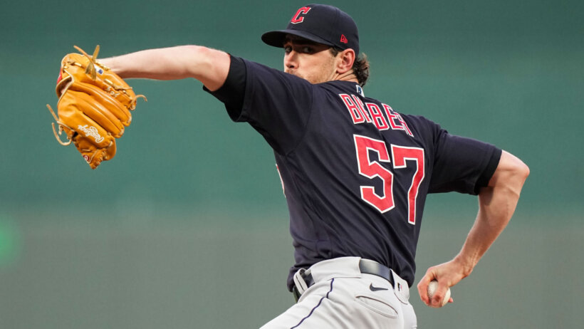 Shane Bieber delivers a pitch
