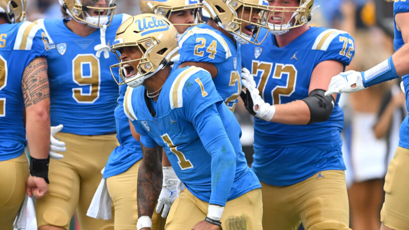UCLA Bruins quarterback Dorian Thompson-Robinson celebrates with running back Zach Charbonnet in the end zone