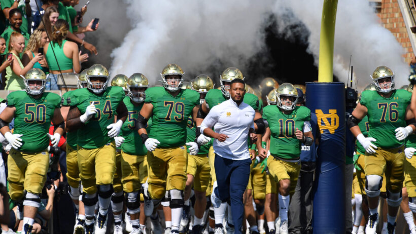 Notre Dame runs out onto the field