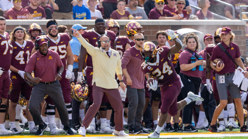 Mohamed Ibrahim tiptoes along the sidelines
