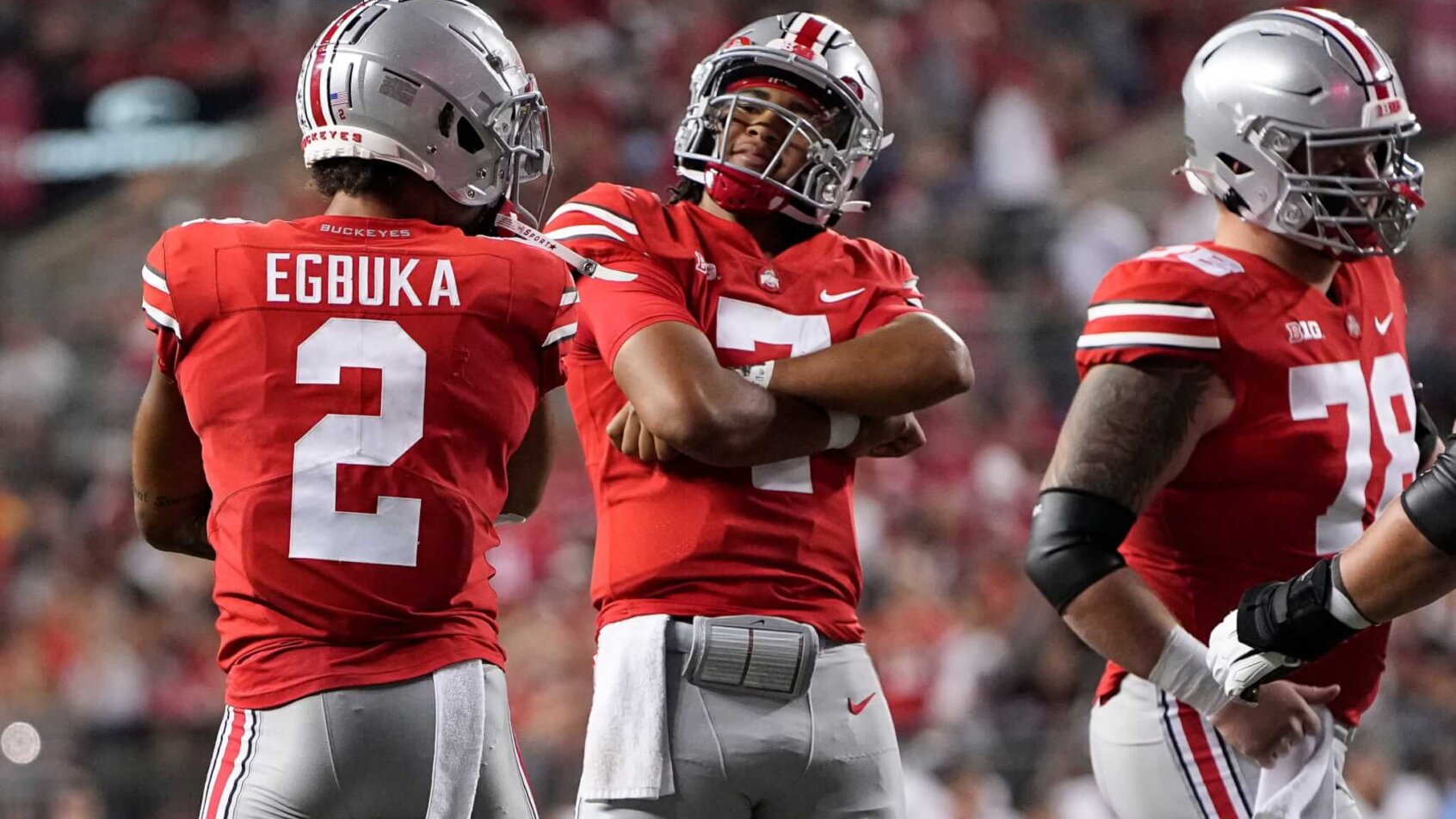 Ohio State Buckeyes quarterback C.J. Stroud celebrates a touchdown with wide receiver Emeka Egbuka