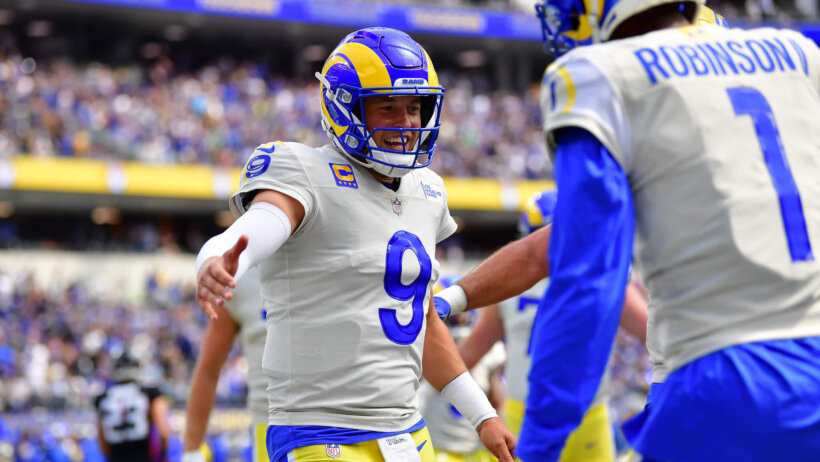 Los Angeles Rams quarterback Matthew Stafford celebrates the touchdown scored by wide receiver Allen Robinson II