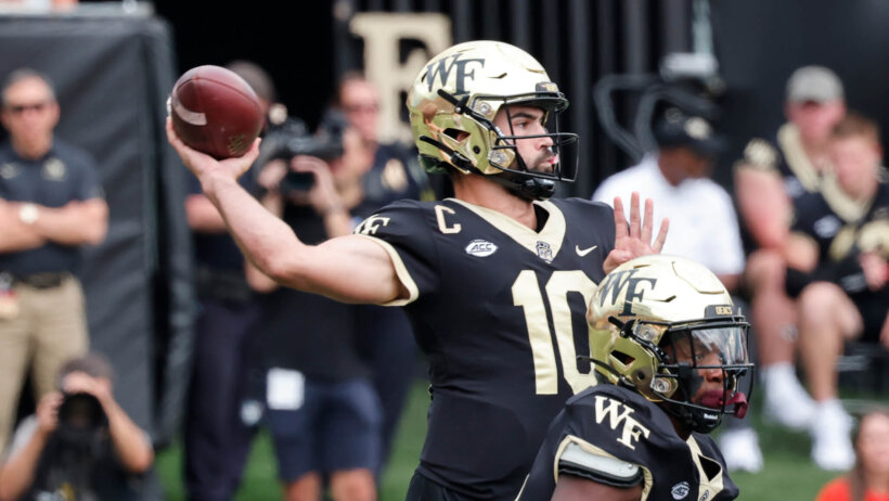 Wake Forest Demon Deacons quarterback Sam Hartman throws a pass