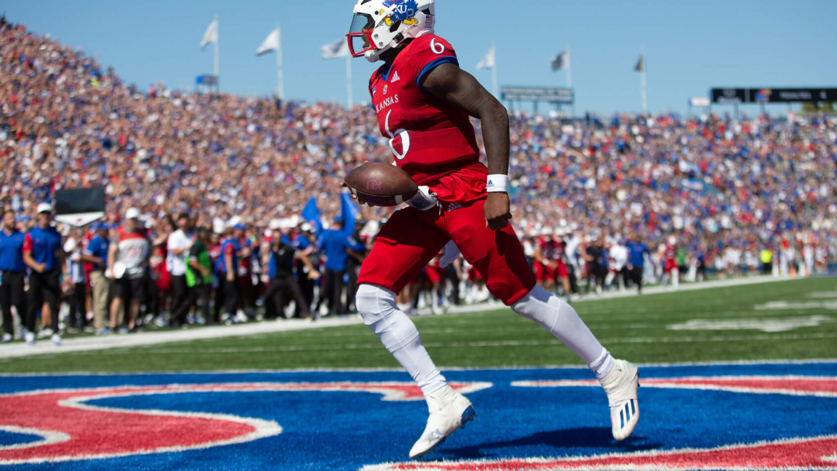 Kansas junior quarterback Jalon Daniels runs in for a touchdown