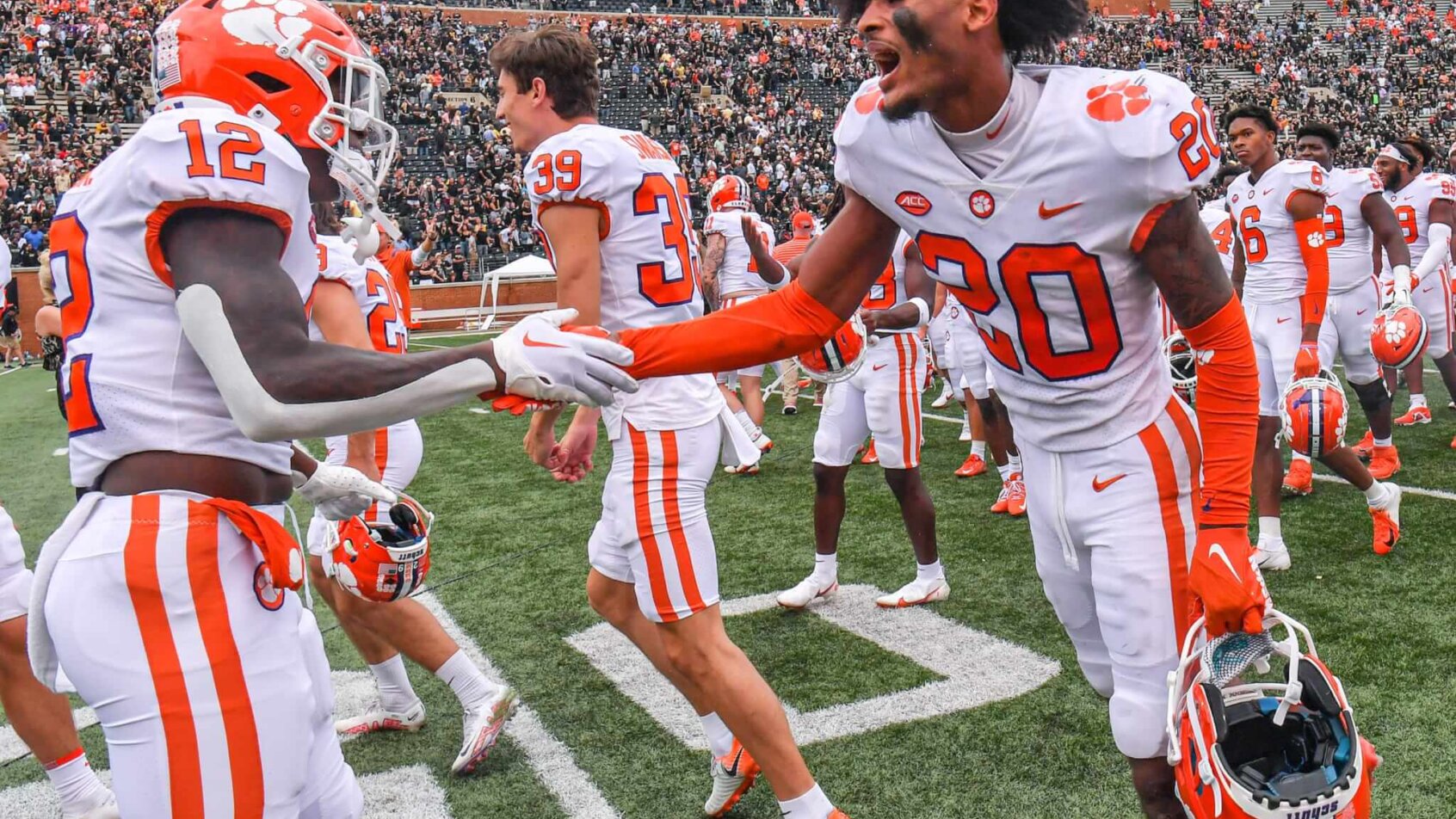 Clemson players celebrate an OT win over Wake Forest