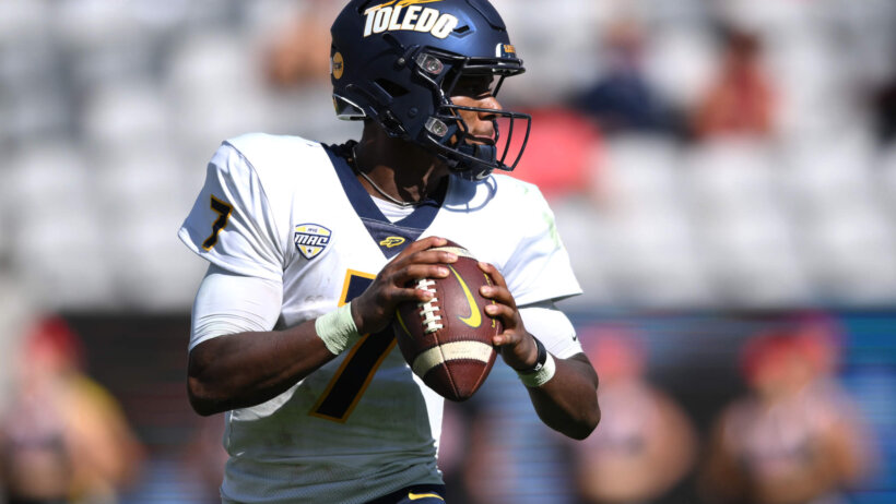 Toledo Rockets quarterback Dequan Finn looks to pass