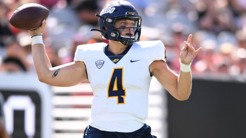 Tucker Gleason throws pass