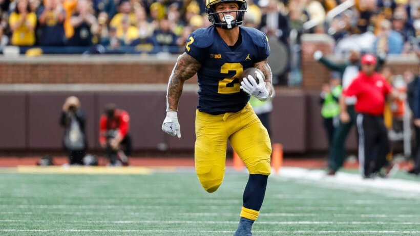 Blake Corum running with ball