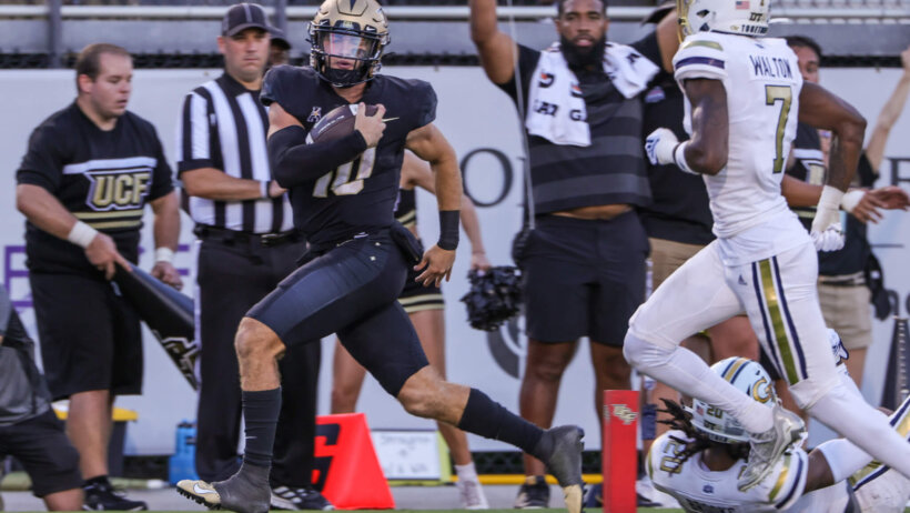 UCF Knights quarterback John Rhys Plumlee scores a touchdown