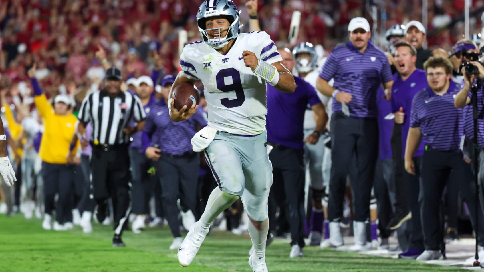 Kansas State Wildcats quarterback Adrian Martinez runs for a touchdown