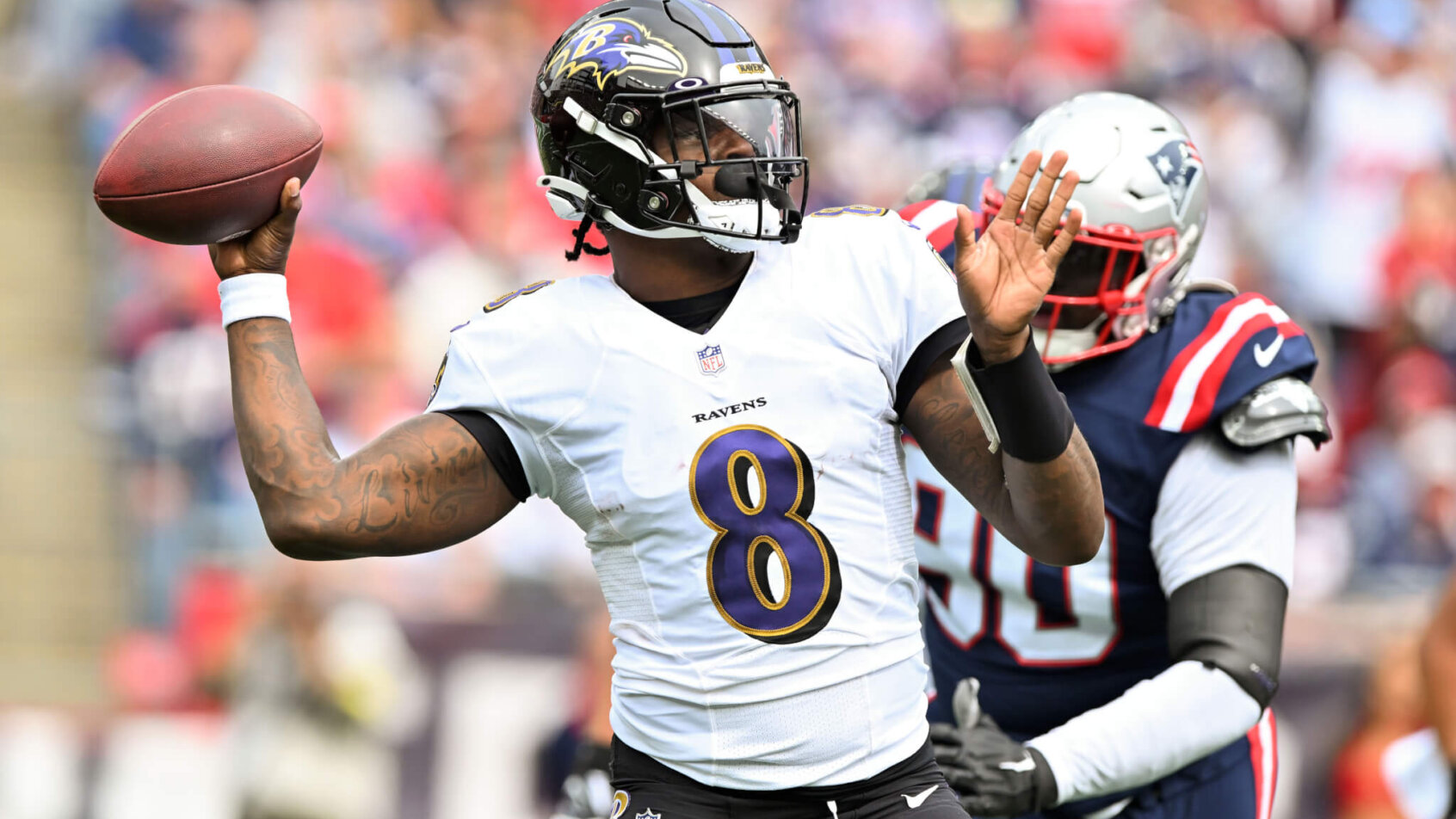 Lamar Jackson drops back to pass