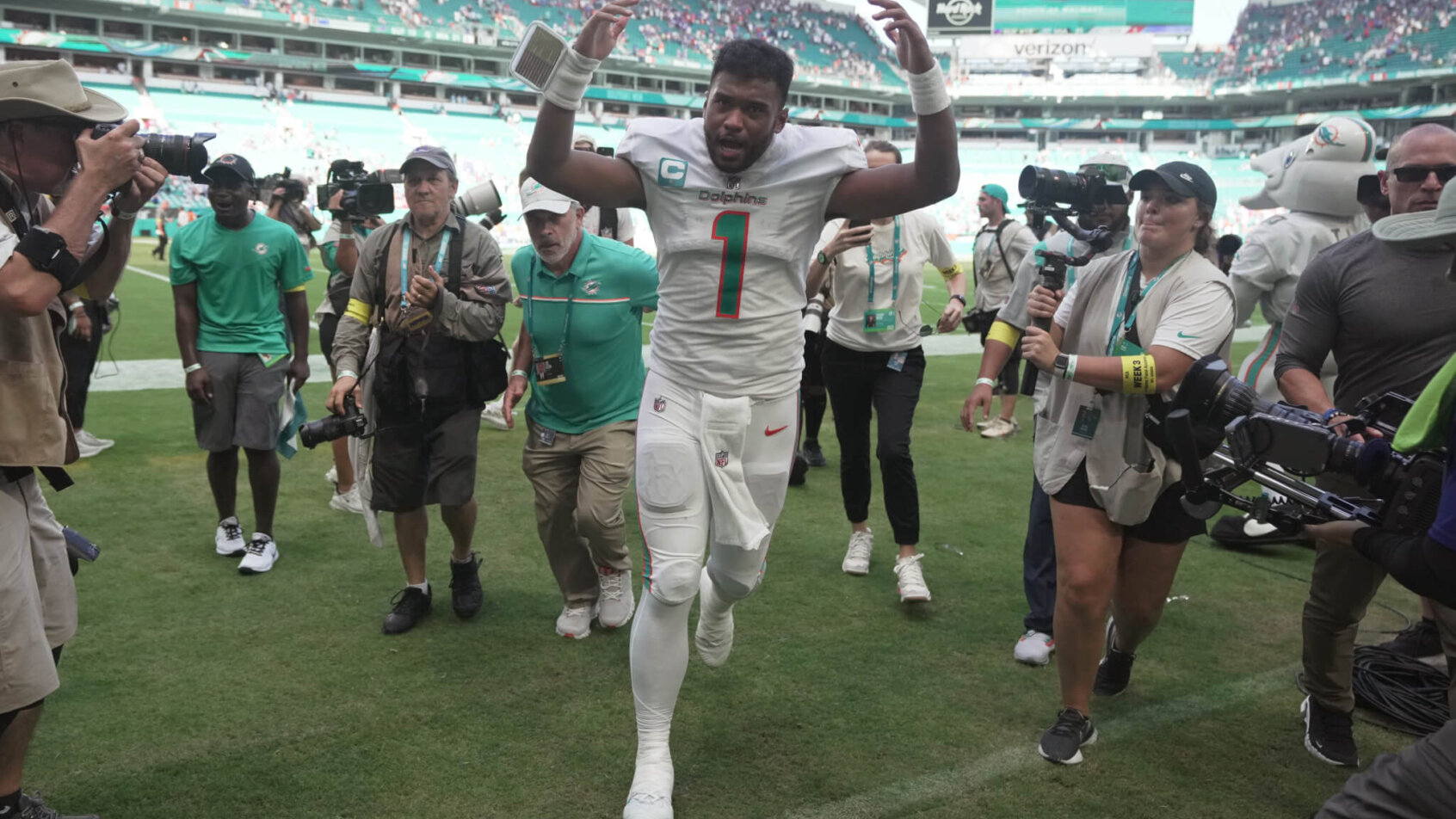 Tua Tagovailoa running off the field