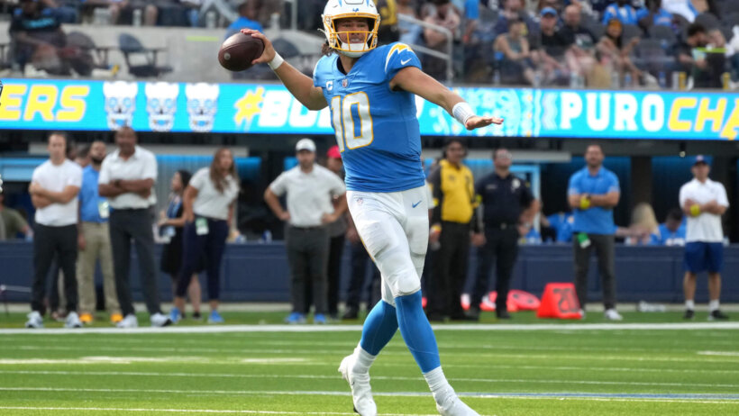 Los Angeles Chargers quarterback Justin Herbert throwing the ball during a game.