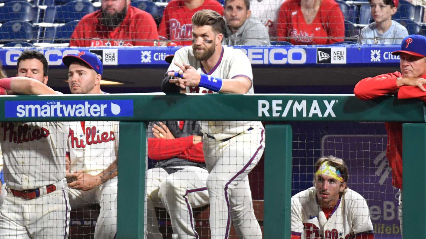Bryce Harper looks on from the dugout