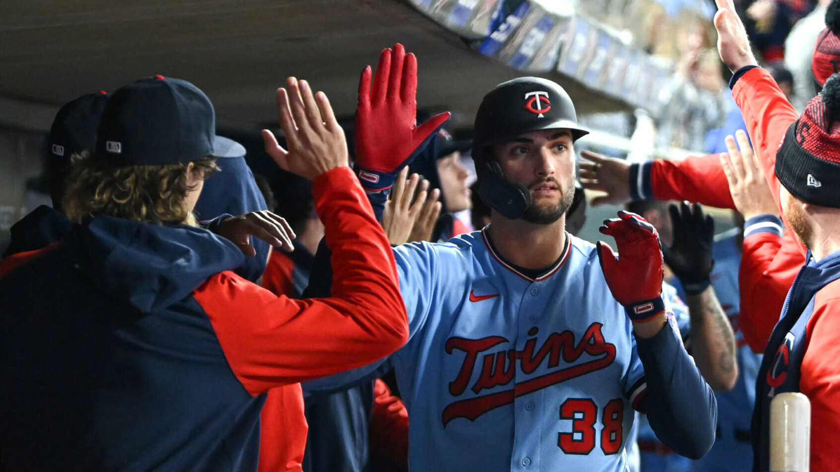Minnesota Twins outfielder Matt Wallner celebrates a home run in the dugout