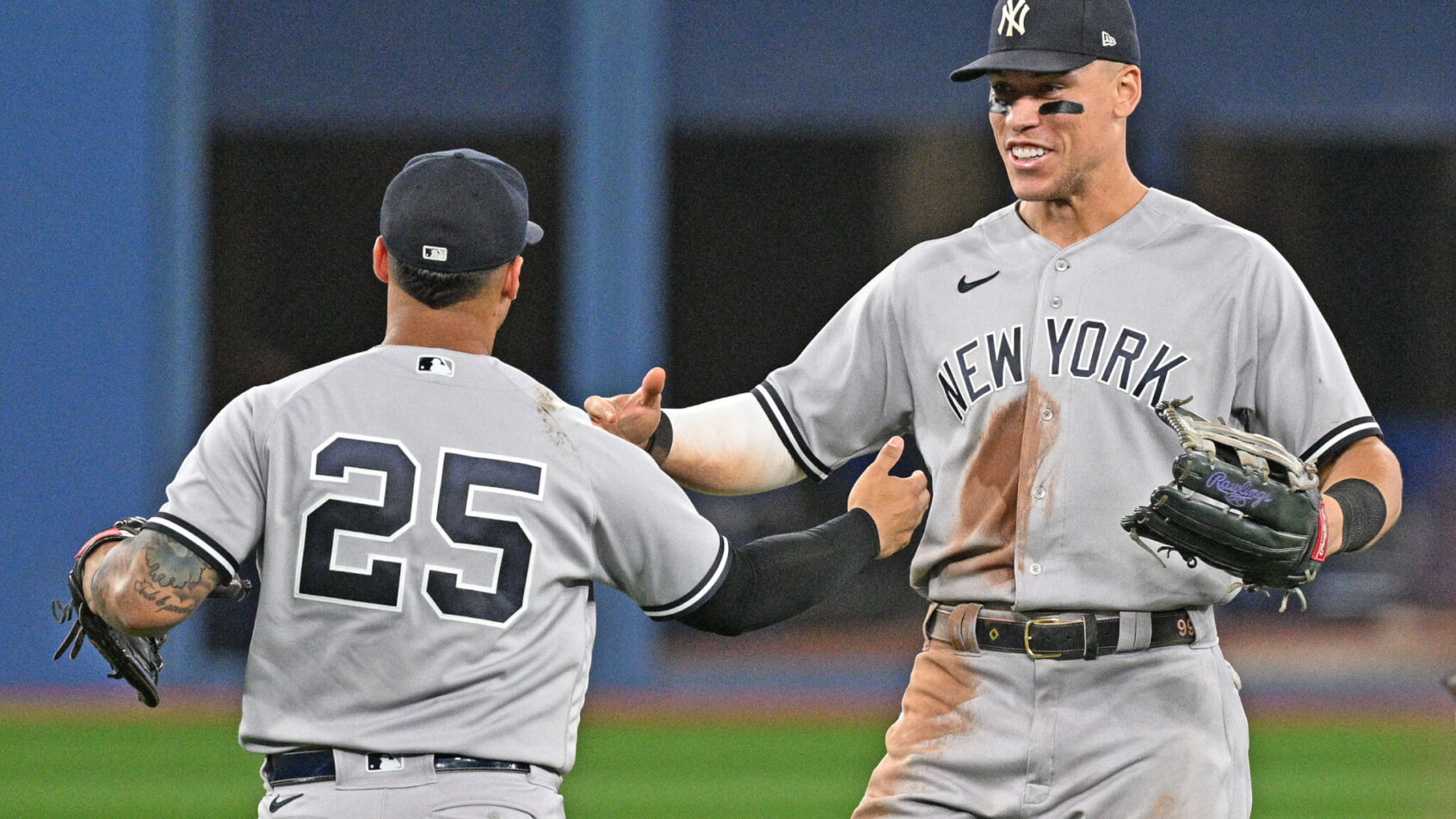 Aaron Judge high-fiving Gleyber Torres