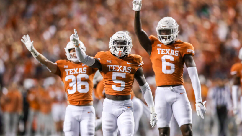 Texas Longhorns defensive back D'Shawn Jamison celebrates after a defensive stop