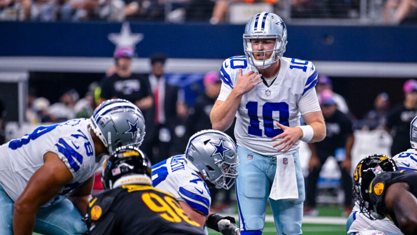 Cooper Rush calling play at line