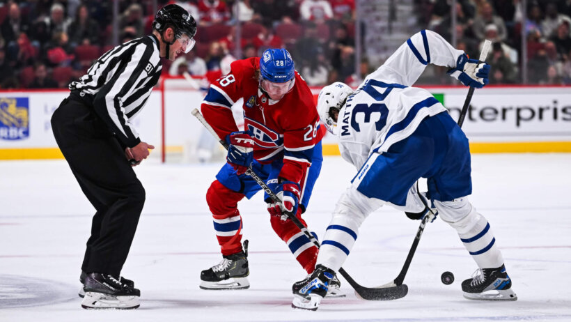 Montreal Canadiens center Christian Dvorak faces off against Toronto Maple Leafs center Auston Matthews