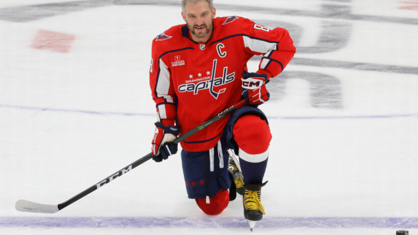 Washington Capitals left wing Alex Ovechkin kneels on ice