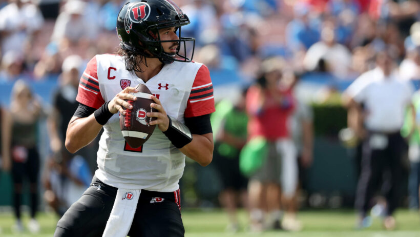 Utah Utes quarterback Cameron Rising looks to pass