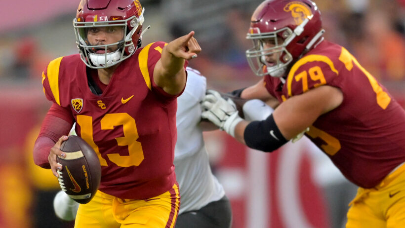 USC Trojans quarterback Caleb Williams moving with the ball