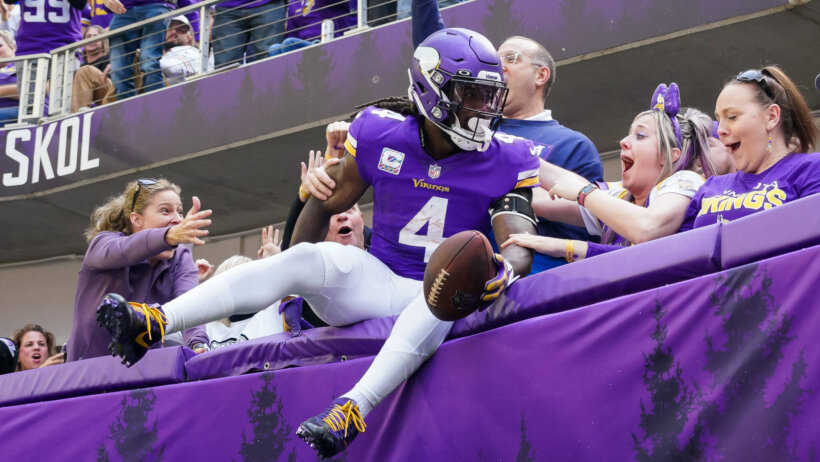 Dalvin Cook leaping into stands