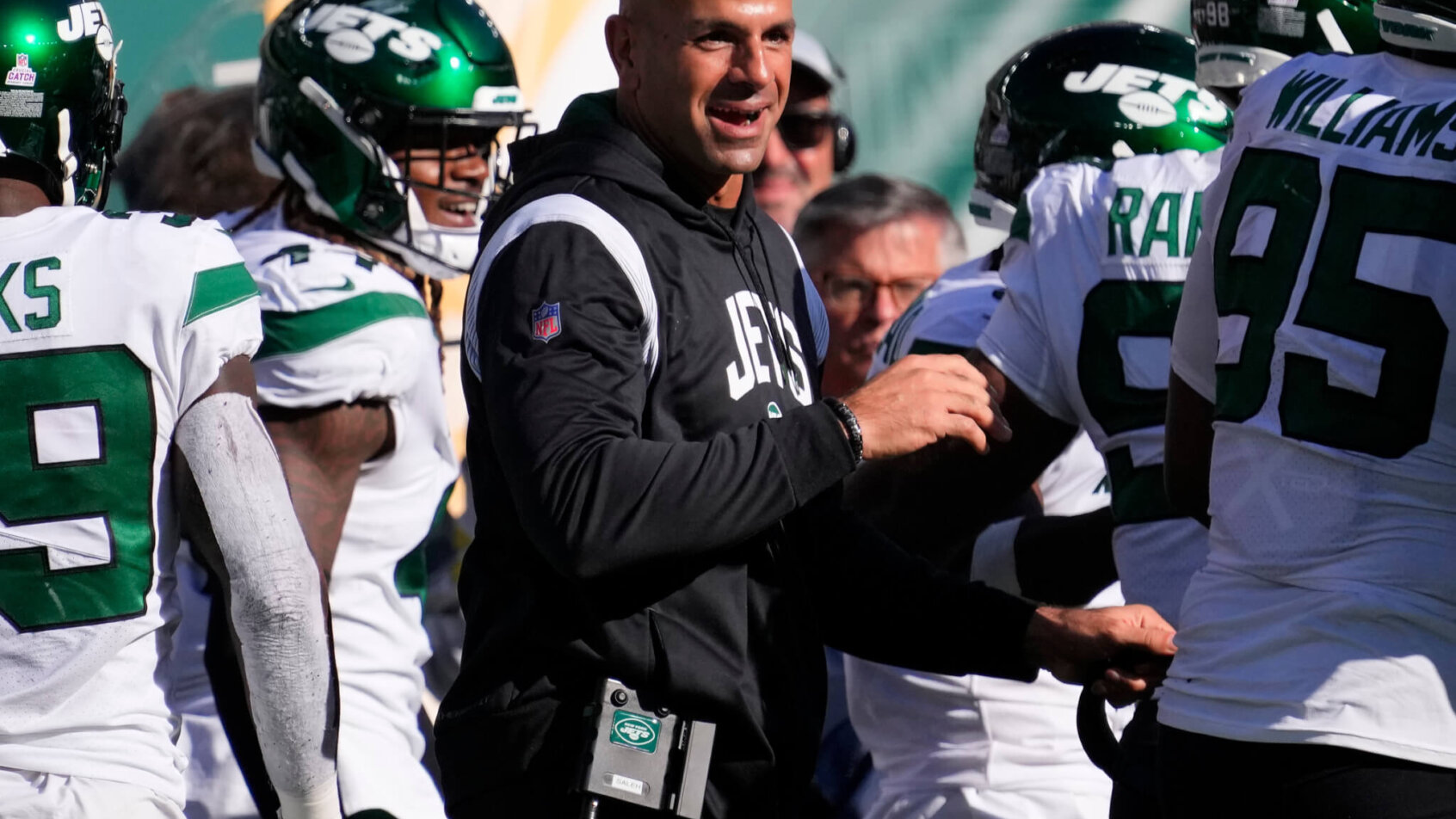 Robert Saleh congratulates his team. AFC East Draft