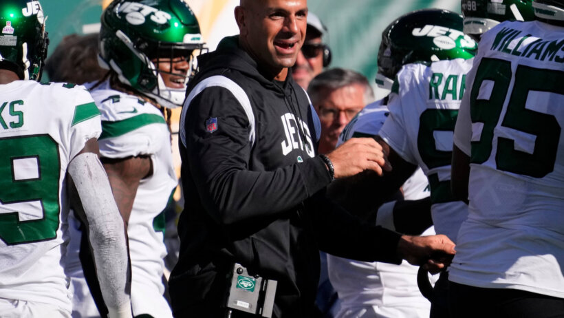 Robert Saleh congratulates his team. AFC East Draft