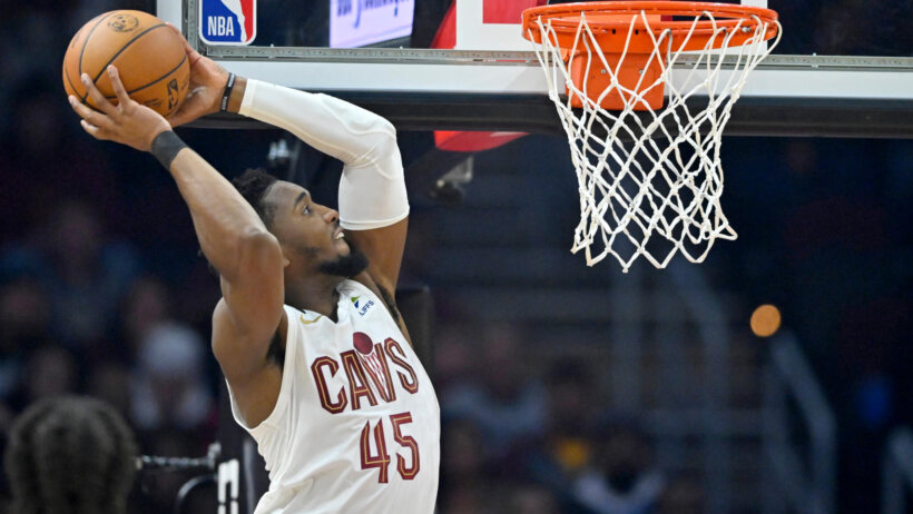 Donovan Mitchell dunks vs the Raptors