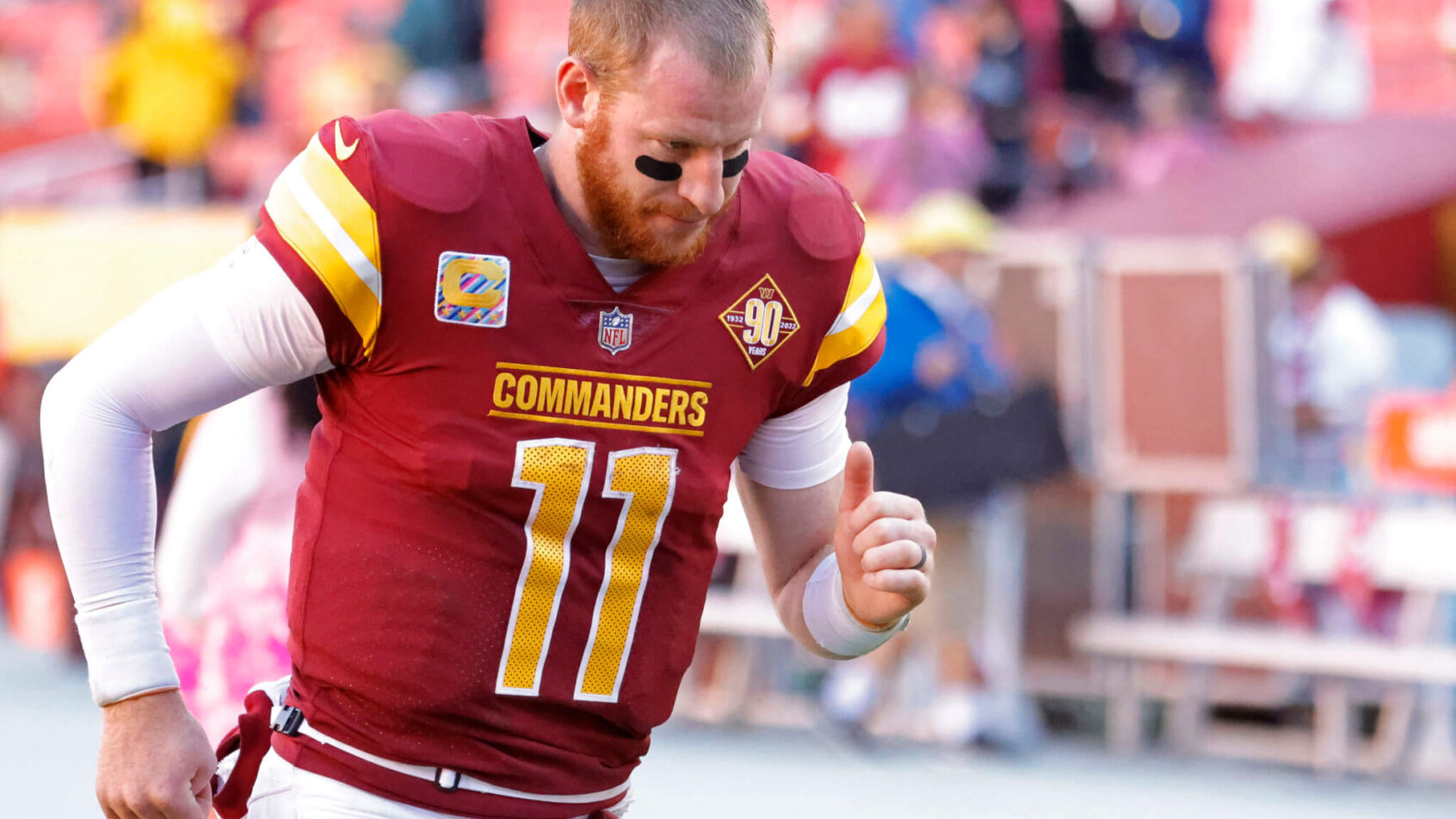 Carson Wentz runs off the field