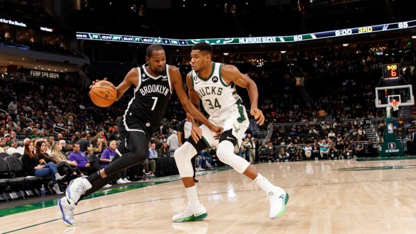 Giannis Antetokounmpo defending Kevin Durant