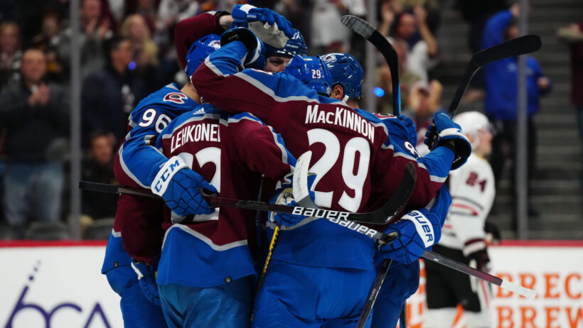 Colorado Avalanche left wing Artturi Lehkonen celebrates after scoring a goal scored with right wing Mikko Rantanen and center Nathan MacKinnon