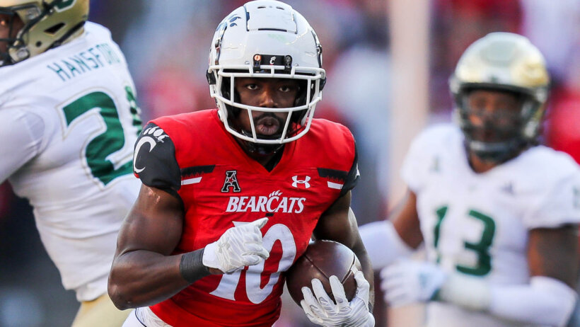 Cincinnati Bearcats running back Charles McClelland runs with the ball