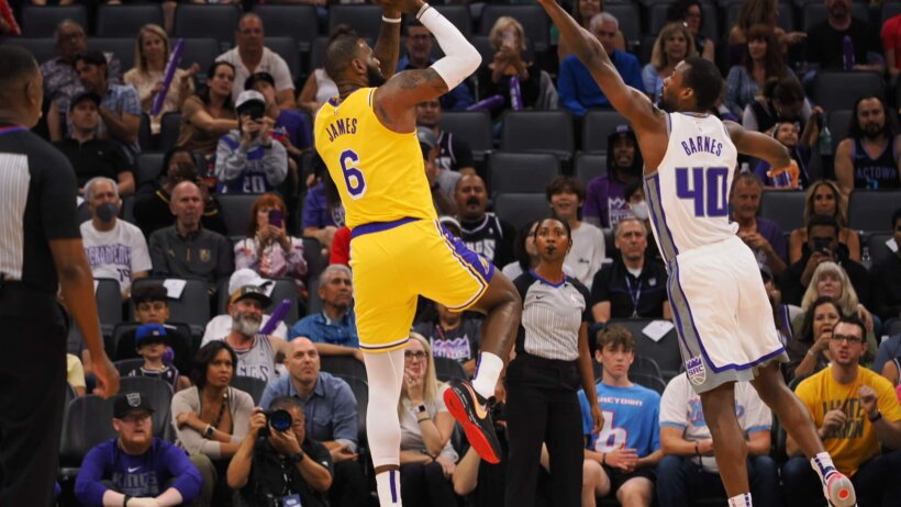 LeBron James takes a jumper during NBA preseason