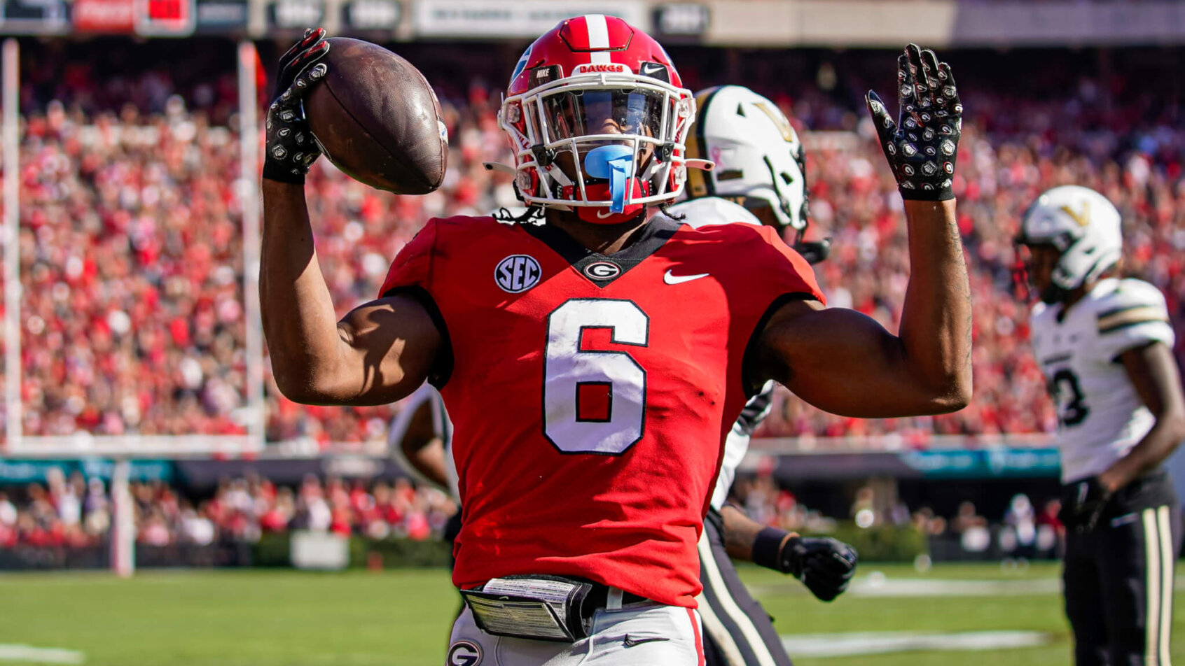 Georgia Bulldogs running back Kenny McIntosh reacts after scoring a touchdown