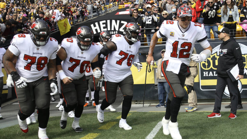 Tampa Bay Buccaneers run out onto the field