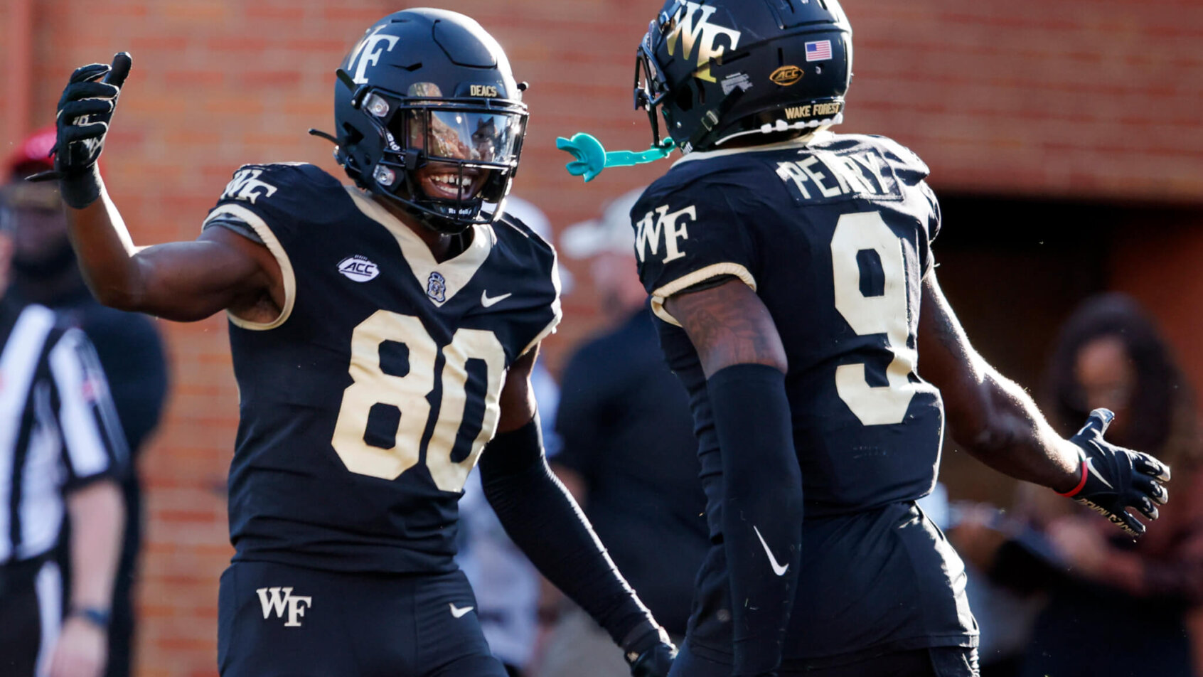 Wake Forest Demon Deacons wide receiver A.T. Perry and wide receiver Jahmal Banks celebrate a touchdown