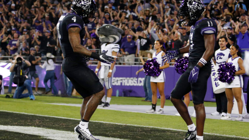 TCU Horned Frogs wide receiver Derius Davis and TCU Horned Frogs wide receiver Taye Barber celebrate a touchdown