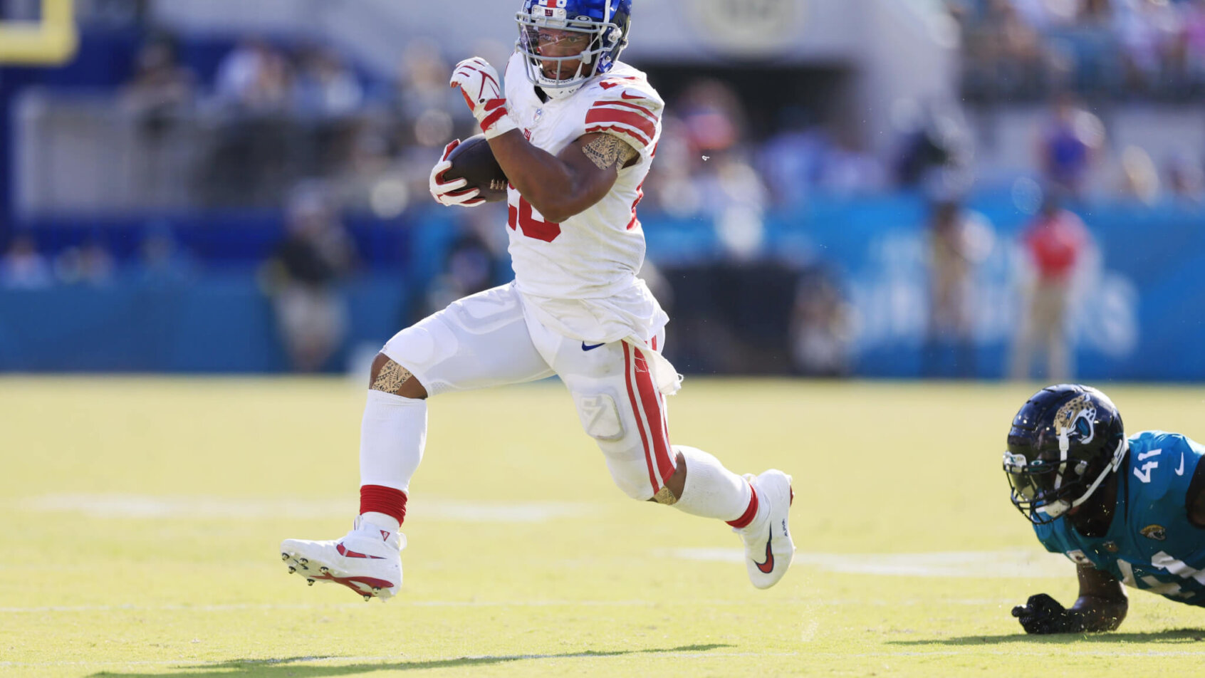 New York Giants running back Saquon Barkley rushes for yards