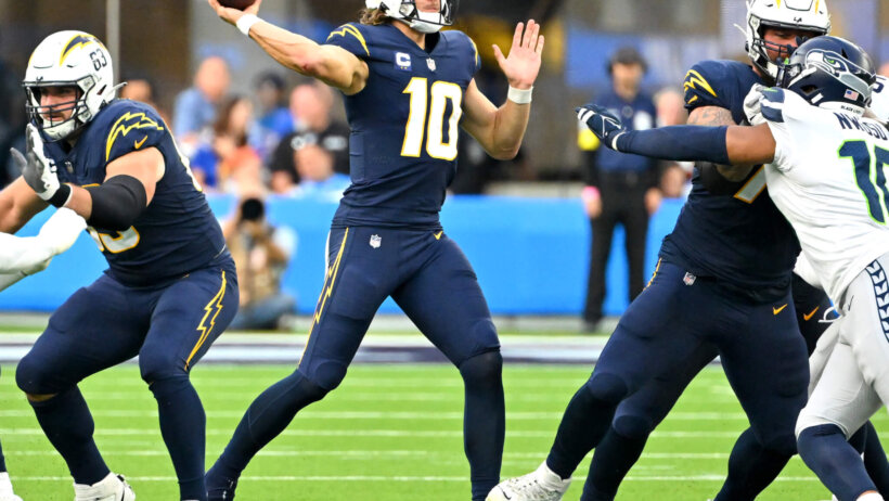 Los Angeles Chargers quarterback Justin Herbert throws a pass
