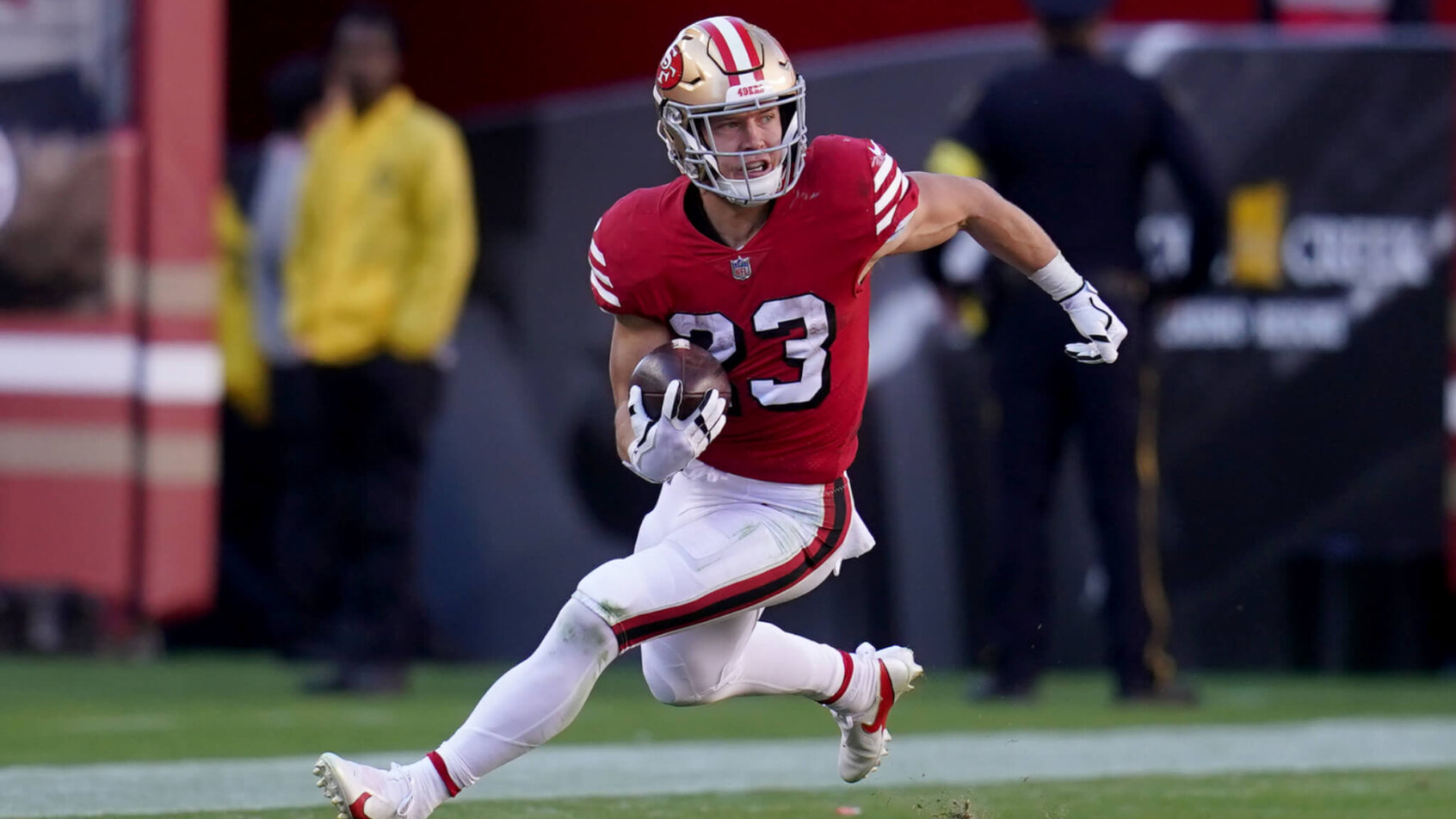 Christian McCaffrey running with ball