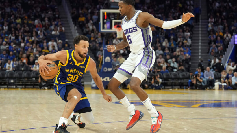 Steph Curry defended by De'Aaron Fox