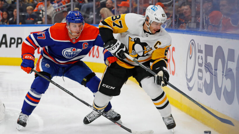 Sidney Crosby defended by Connor McDavid